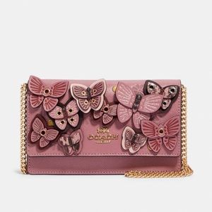 Coach butterfly belt bag.